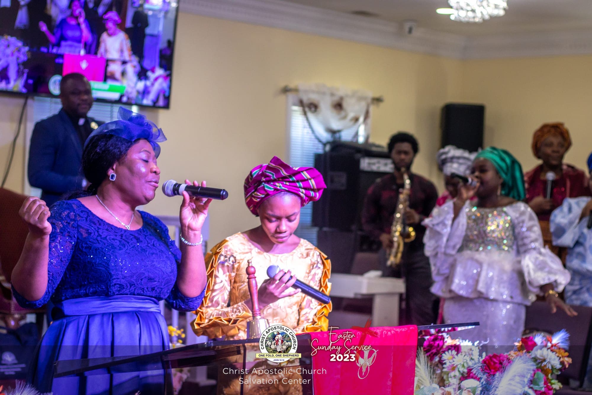 Women singing at Sunday service